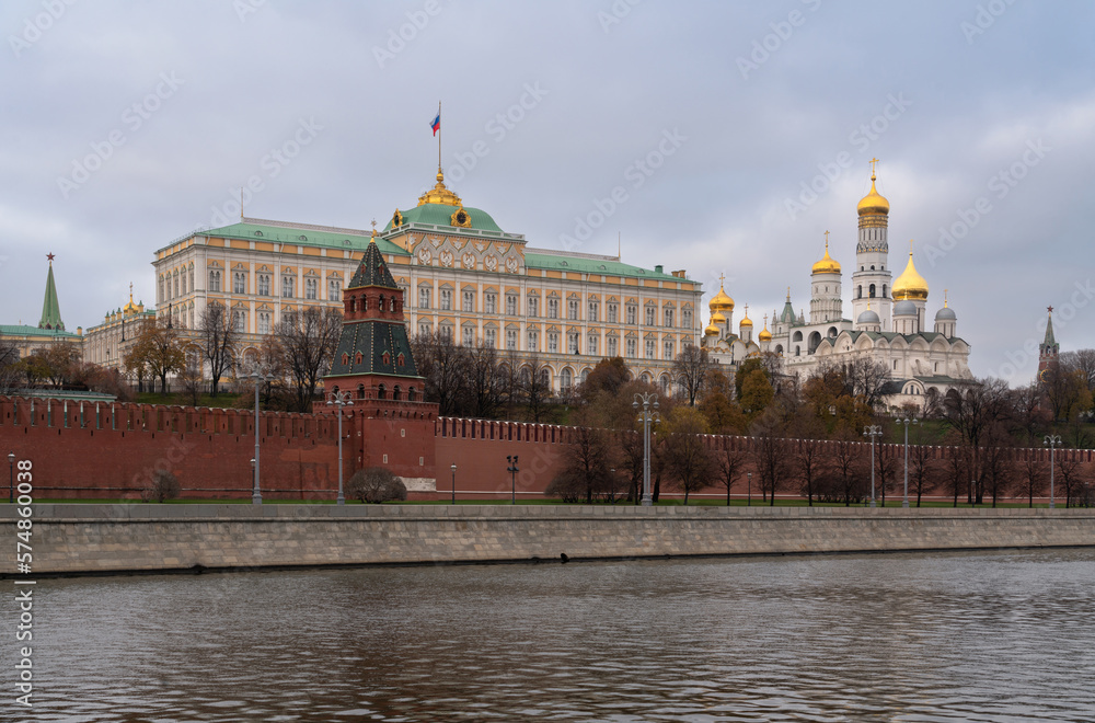 View of the building of the Grand Kremlin Palace, the Annunciation Tower and the ensemble of the Kremlin Cathedral Square from the embankment of the Moskva River, Moscow, Russia