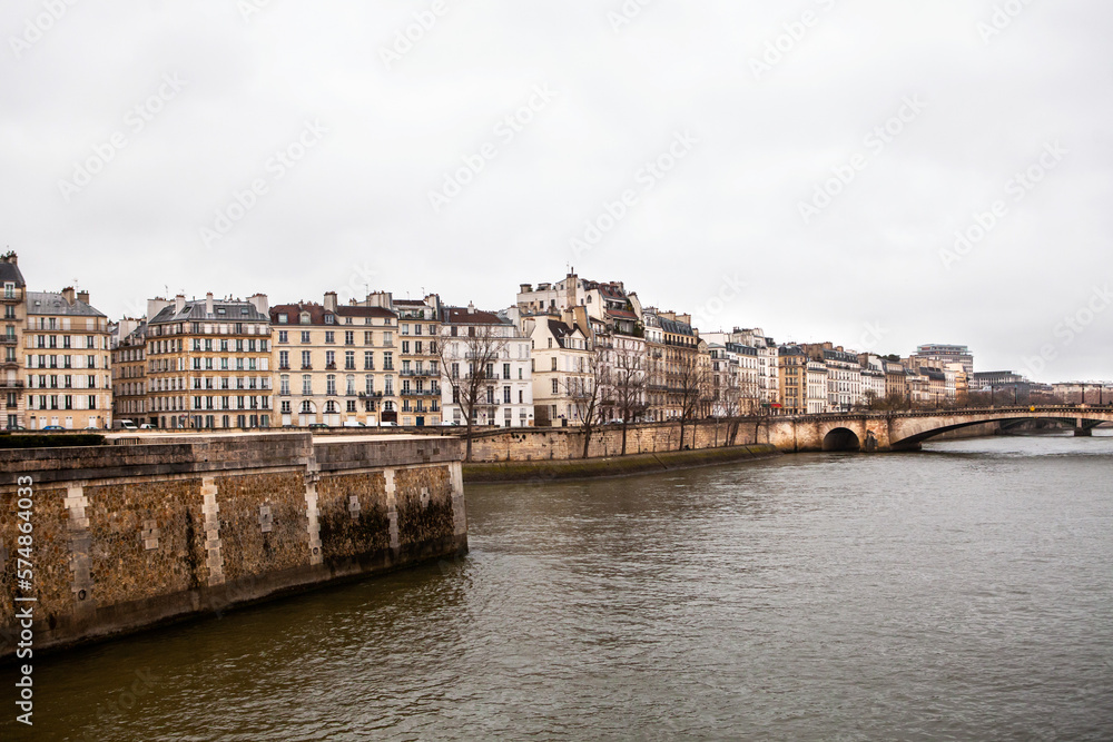 Buildings in Paris, France along the Seine River in winter.
