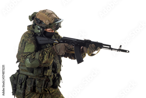 A russian mercenary soldier with AK-74 in his hand and aiming in enemy. © Stavros