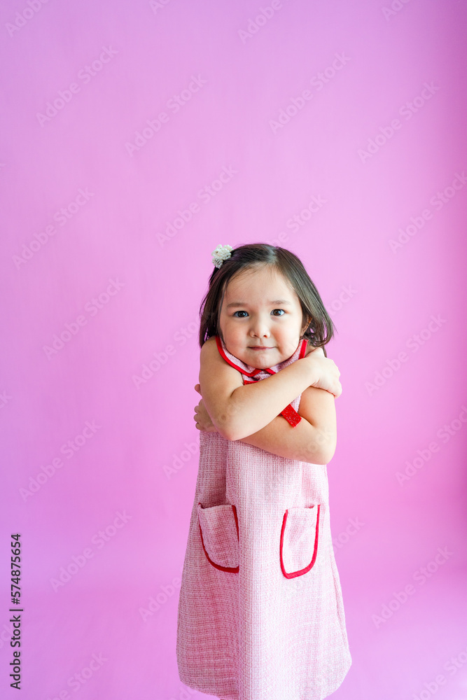 Pretty little girl acting cold and shivering. Pretty little girl acting cold and shivering.
