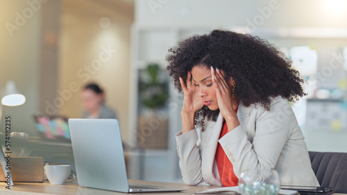 Slika na platnu Stressed software analyst typing on laptop with headache and making a mistake while analysing business or company data