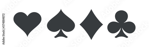 A set of card suits. A symbol of a deck of playing cards or gambling games (poker, bridge). Four card suits: spades, hearts, diamonds and clubs. photo