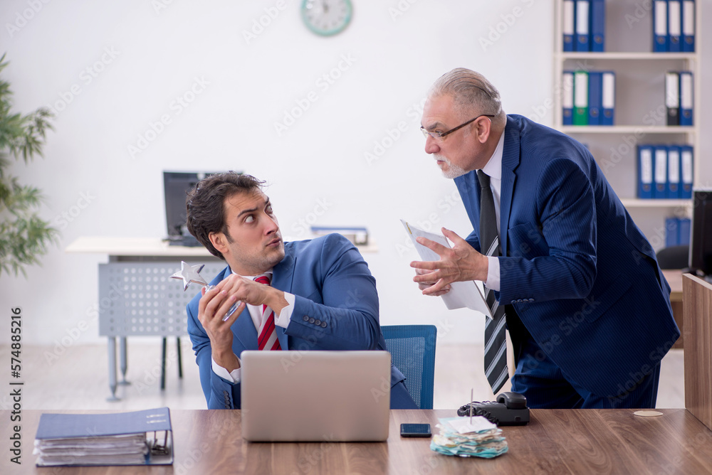 Two male colleagues in employee of the month concept Two male colleagues in employee of the month concept