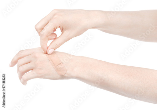 Female caucasian hands sticking medical adhesive wound plaster isolated white background. Woman hands with surgical tape showing different gestures. first aid bandage