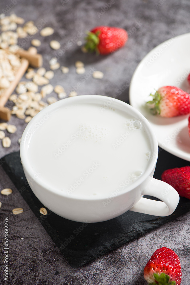 breakfast with milk and strawberries on table breakfast with milk and strawberries on table