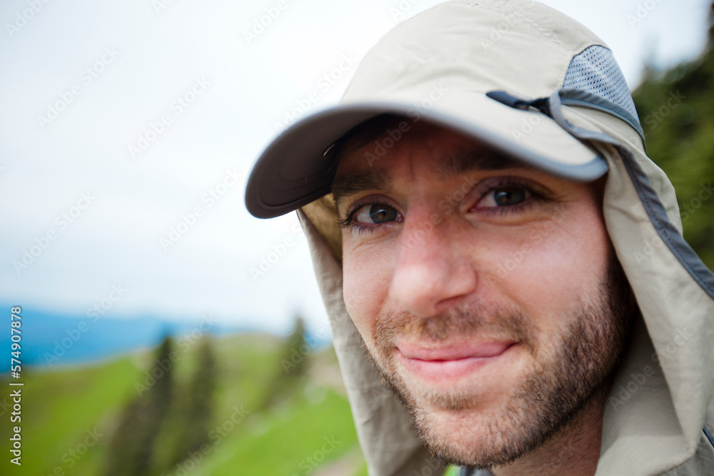 Portrait of a hiker wearing a bug net hat. Portrait of a hiker wearing a bug net hat.