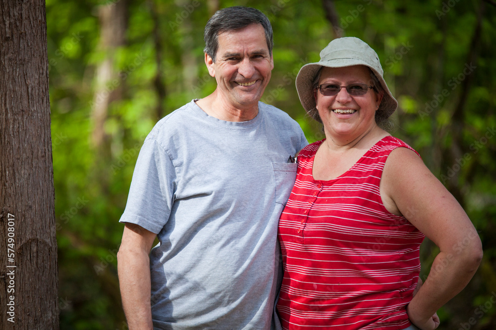 Outdoor portrait of a middle-aged couple. Outdoor portrait of a middle-aged couple.