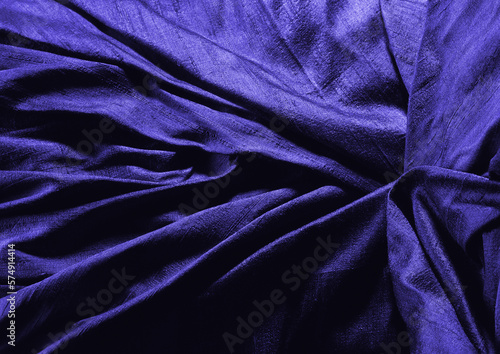 Deep blue glossy cloth texture background. Natural textile material photo, pattern cover