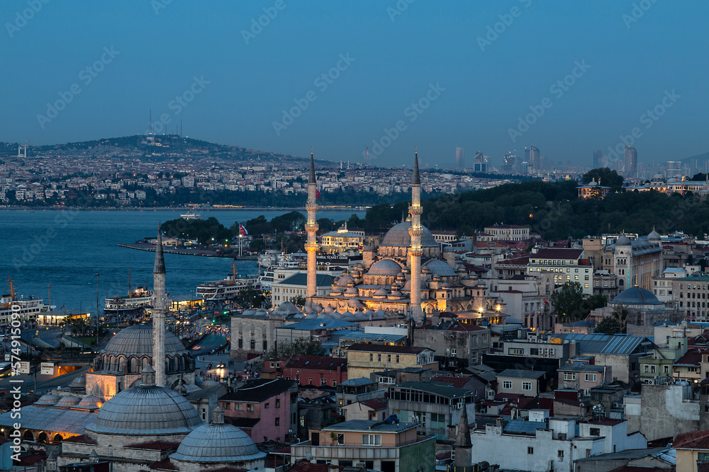 Top view of Istanbul with New Mosque and Rustem Pasha Mosque in the evening. Istanbul, Turkey