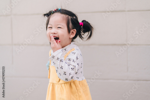 Cute little girl Asian happiness shot outdoors, 2-3 year old