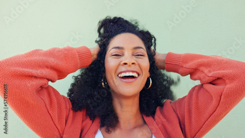 Fotografie Hands of happy woman play with hair, beauty and smile from Portugal girl feeling freedom, excited and wellness