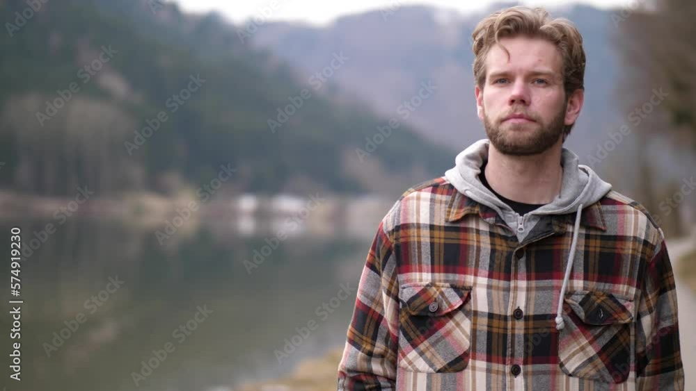 after a short nod, a young blond man marches off, looking determined. Then he sees something that takes away his serious look and suddenly he takes his hands out of his sleeves to... after a short nod, a young blond man marches off, looking determined. Then he sees something that takes away his serious look and suddenly he takes his hands out of his sleeves to...