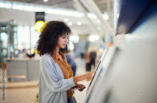 Tableau sur toile Black woman, airport and self service station for ticket, registration or online boarding pass