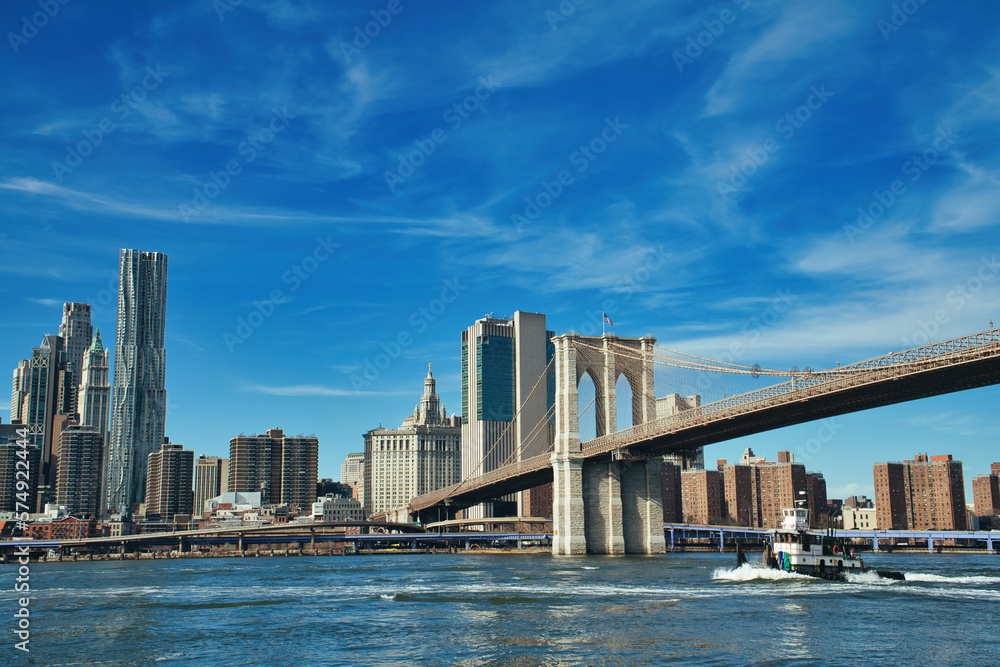 Brooklyn Bridge with Manhattan skyline in background in New York City