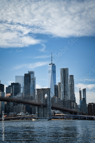 Brooklyn Bridge with Manhattan skyline in background in New York City © uhdenis