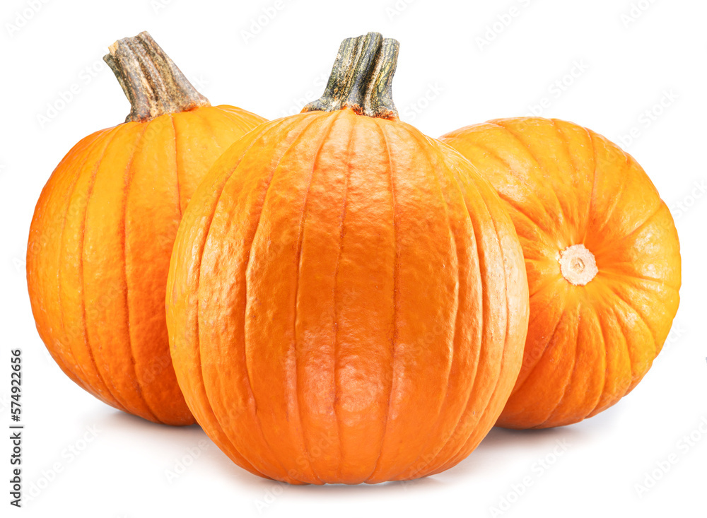 Obraz premium Three orange round pumpkins, symbol of Halloween isolated on white background.