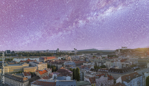 Canvas Print Aerial view of Bratislava from drone on a starry night above the city, Slovakia
