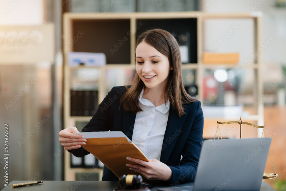 woman lawyer working and gavel, tablet, laptop in front, Advice justice and law concept.. woman lawyer working and gavel, tablet, laptop in front, Advice justice and law concept..