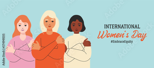 A group of girls hugging themselves. International Women's Day banner, movement embrace equity