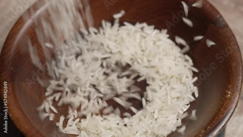 Dry Rice Poured in Wooden Bowl 2