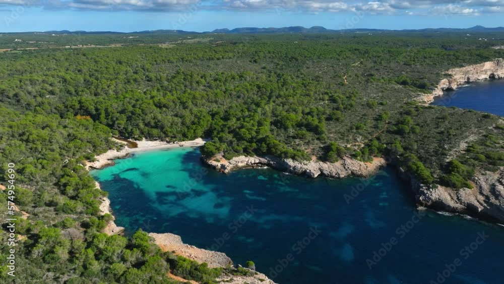 Aerial view of Es Talaier virgin Beach with clear blue water in Menorca Spain Aerial view of Es Talaier virgin Beach with clear blue water in Menorca Spain