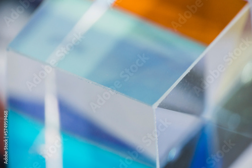 Crystal cube with colorful gradient reflection photo