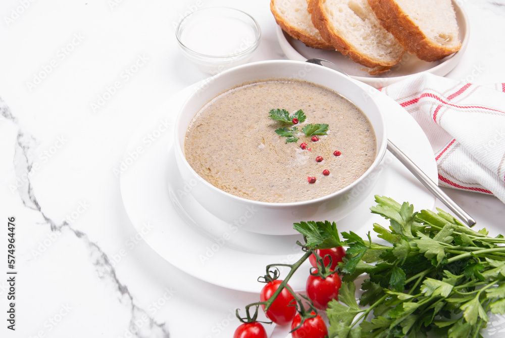 Cream soup with vegetables on cream on a white table. Soup for lunch. Cream soup with vegetables on cream on a white table. Soup for lunch.