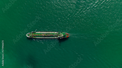 Oil Ship tanker or Liquid fied Petroleum Gas (LPG) sailing in green sea aerial top view © SHUTTER DIN