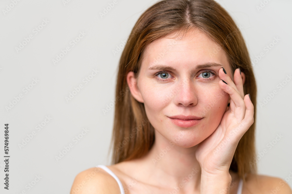 Portrait of pretty young woman over isolated white background Portrait of pretty young woman over isolated white background