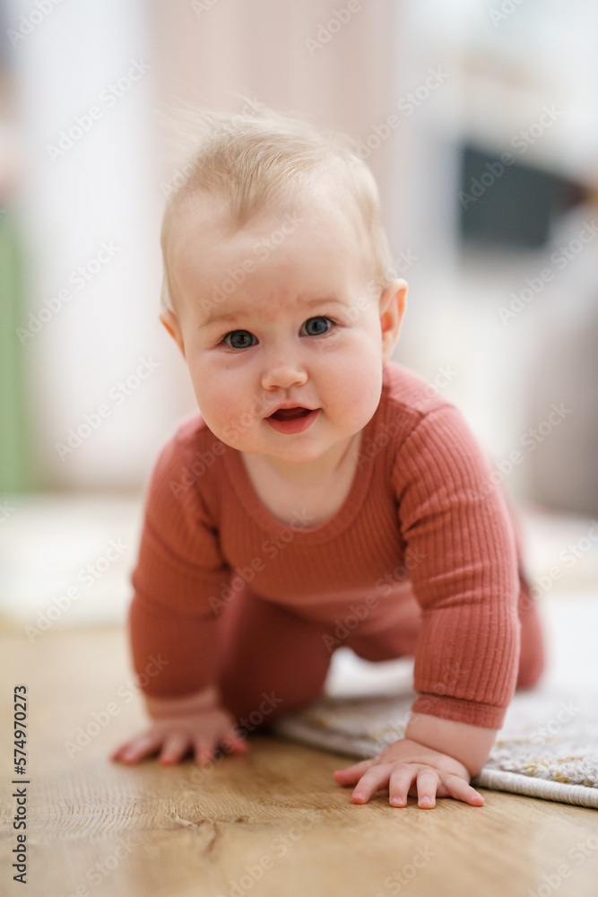 Caucasian baby toddler crawls on all fours around the room Caucasian baby toddler crawls on all fours around the room