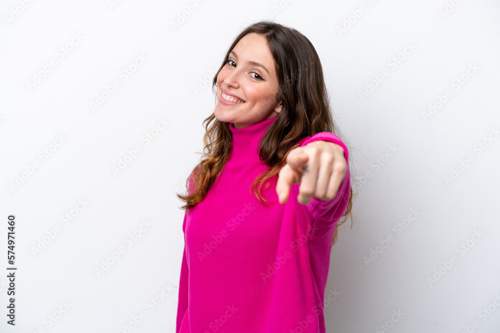 Young caucasian woman isolated on white background pointing front with happy expression Young caucasian woman isolated on white background pointing front with happy expression