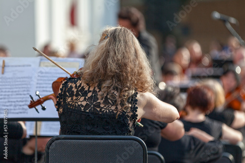 Violinist playing during an outdoor concert in Odessa