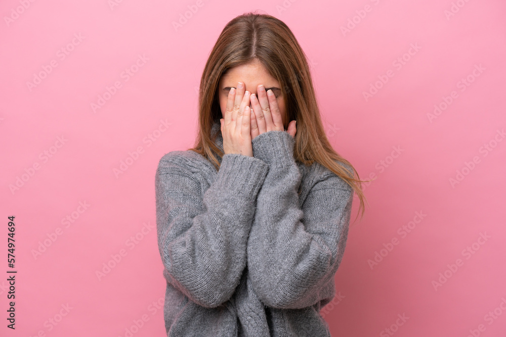 Young caucasian woman isolated on pink bakcground with tired and sick expression Young caucasian woman isolated on pink bakcground with tired and sick expression