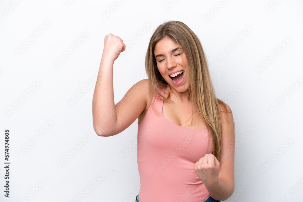 Young caucasian woman isolated on white bakcground celebrating a victory Young caucasian woman isolated on white bakcground celebrating a victory