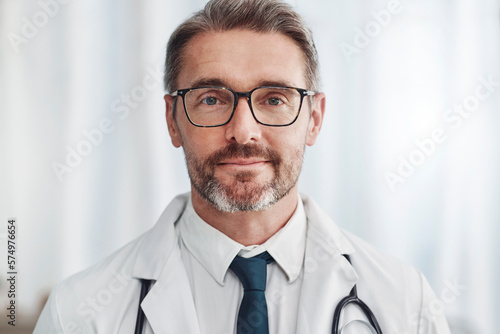 Healthcare, leadership and portrait of mature doctor, man in hospital for support, pride and help in medical work. Health, wellness and medicine, confident professional with stethoscope and smile.