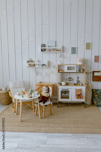 Children's kitchen in a room with toys