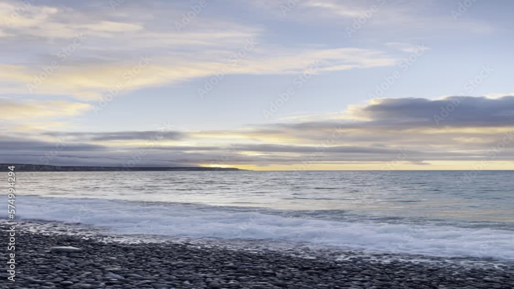 Vertical video of Normandy sea and cliffs at sunset. Calming sea vertical video for social media short form content. Relaxing ocean sounds on beach at sunset in Fécamp HDR video. Vertical video of Normandy sea and cliffs at sunset. Calming sea vertical video for social media short form content. Relaxing ocean sounds on beach at sunset in Fécamp HDR video.