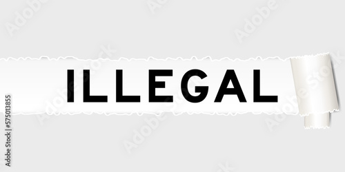 Ripped gray paper background that have word illegal under torn part