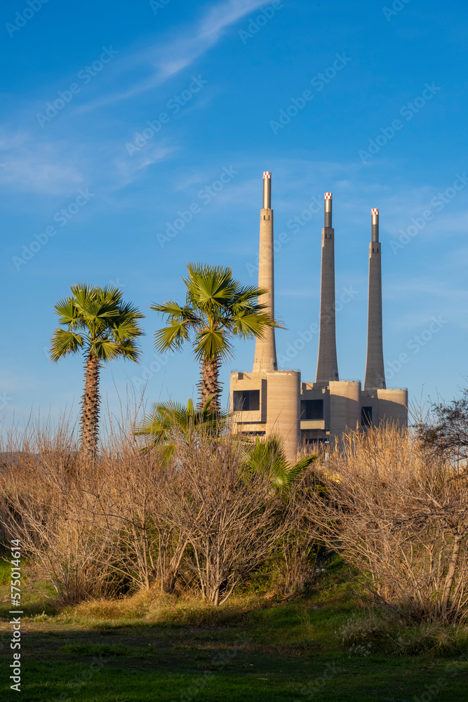 Chimneys of an old thermal power station in Sant Adria de Besos in the metropolitan area of Barcelona in Spain Chimneys of an old thermal power station in Sant Adria de Besos in the metropolitan area of Barcelona in Spain