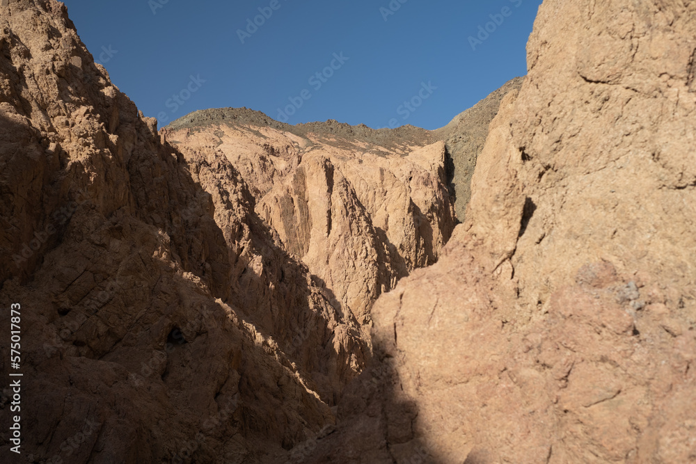 Sinai mountains at daytime, blue sky, top view of the mountains, colorful canyon at sunset in Egypt sunny day, landscape Sinai mountains at daytime, blue sky, top view of the mountains, colorful canyon at sunset in Egypt sunny day, landscape