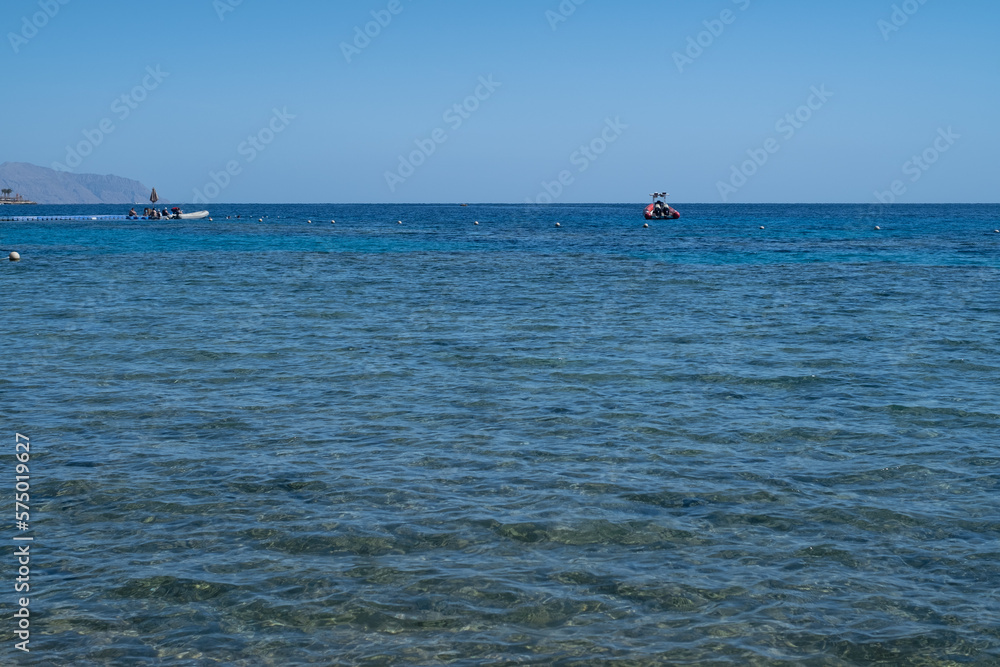 Fototapeta premium Red Sea in the Gulf of Aqaba, surrounded by the mountains of the Sinai Peninsula, Dahab, Egypt