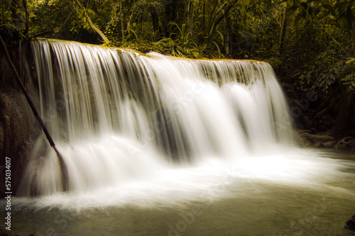 Huay Mae Kamin waterfall in deep rain forest jungle in Kanchanaburi, Thailand) © Thanunsak