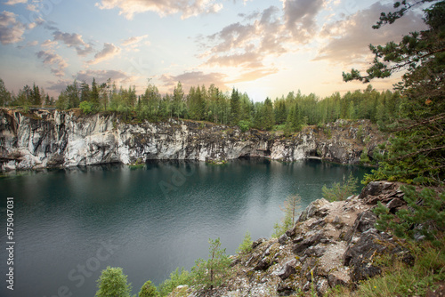 Lovely landscape of scenic cloudy sunset and mountain river