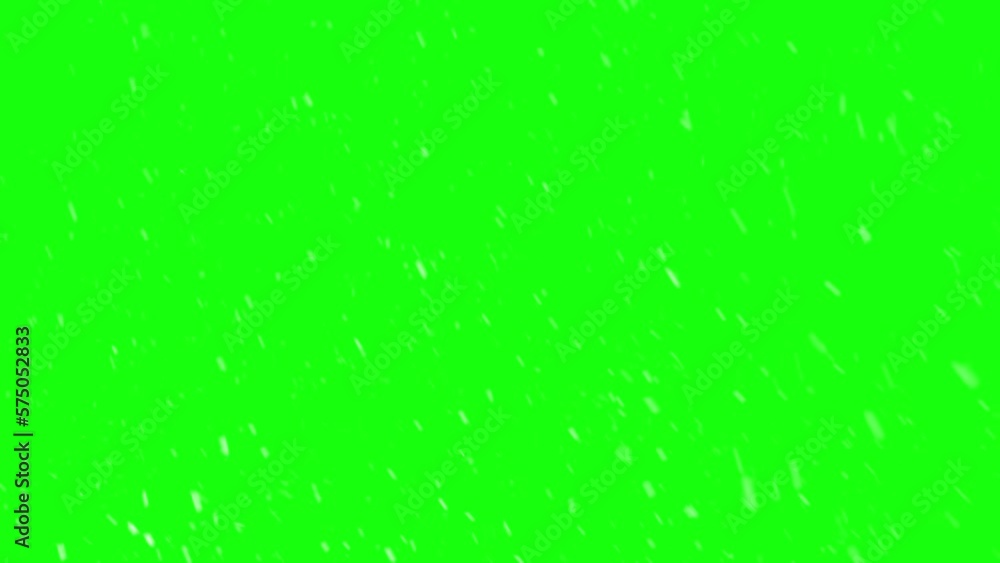 Real snow falling on green screen background in winter season Real snow falling on green screen background in winter season