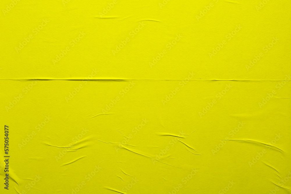 Close-up yellow sheet of paper with folds. Close-up yellow sheet of paper with folds.
