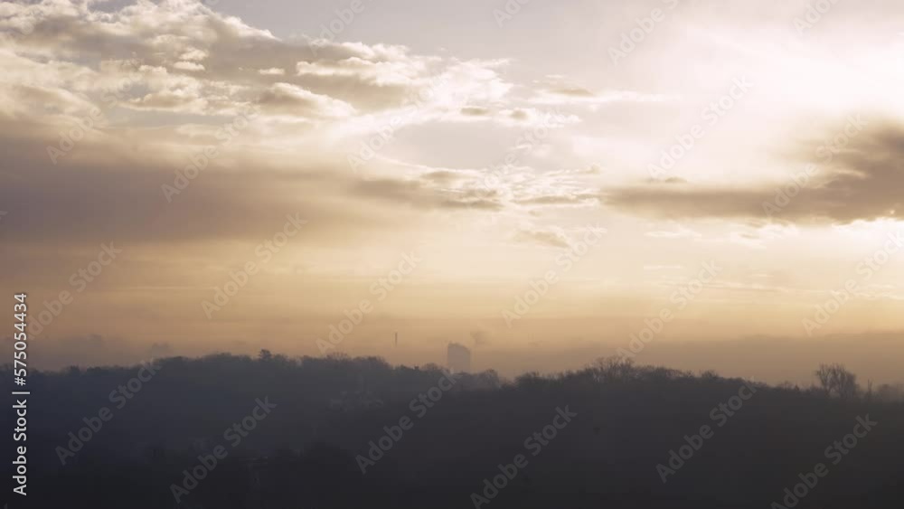 Climate deadly situation. Changing of the climate. Global warming. An epic sight of smog and disease hanging over Kiev at dawn. Climate deadly situation. Changing of the climate. Global warming. An epic sight of smog and disease hanging over Kiev at dawn.