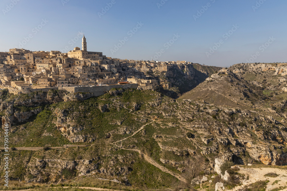 Panorama of Matera, a UNESCO World Heritage Site. European Capital of Culture. View from the Murgia Park. Timeless walk on Paleolithic caves and paths. City similar to Jerusalem. Unforgettable journey