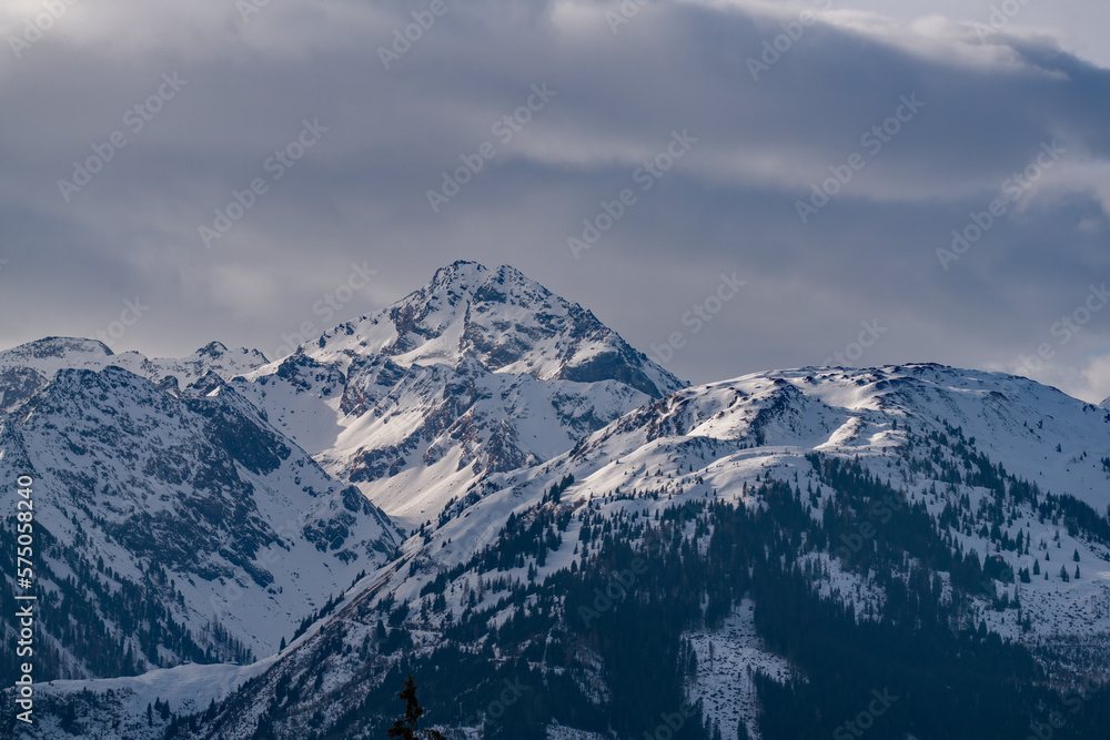 beautiful view of the snow capped hohe tauern in austria on at a spring day 