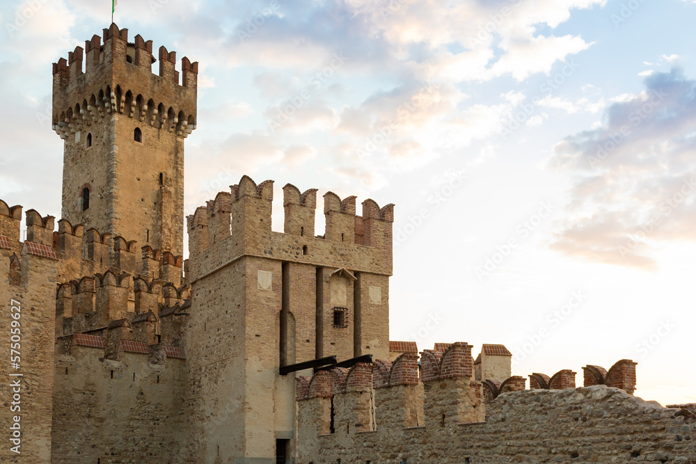 Sirmione, Italy - castle on Garda lake. Scenic mediaeval building on the water