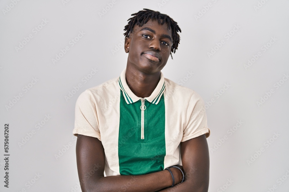 African man with dreadlocks standing over isolated background depressed and worry for distress, crying angry and afraid. sad expression. African man with dreadlocks standing over isolated background depressed and worry for distress, crying angry and afraid. sad expression.